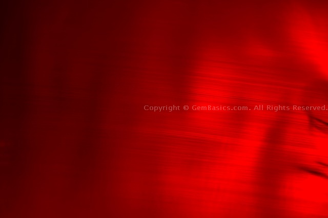 Curved striae in Verneuil synthetic sapphire